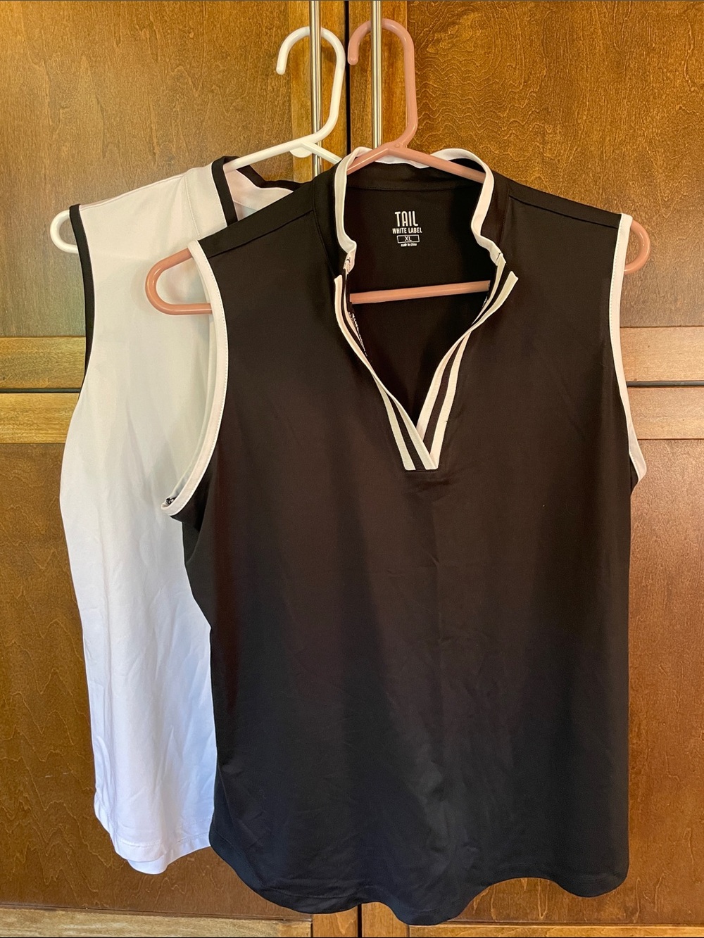 TAIL Women’s Sleeveless V‑Neck Golf Tanks in Black with White